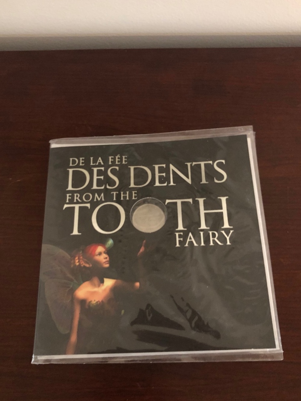 Royal Canadian mint collectors tooth, fairy coin
